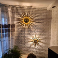 s.luce Diator Wand- und Deckenleuchte mit Sonne-Design, handgeschmiedet, erzeugt faszinierende Lichteffekte.