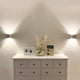 s.luce Plinth Wandleuchte aus Beton Grau