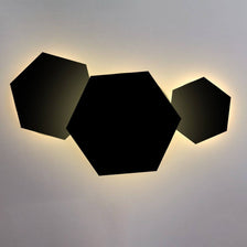 Combinaison d’appliques indirectes Hive s.luce LED en forme hexagonale avec éclairage indirect