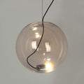 s.luce Sphere Hängeleuchte aus Glas mit E27 Leuchtmittel, moderne, asymmetrische Lichtverteilung und zeitgemäßem Design.