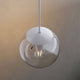 s.luce Abdeckung für Orb Glaskugel an moderner Pendelleuchte in elegantem Design.
