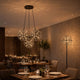 s.luce Atom Cluster LED Mehrfach-Pendelleuchte 3-flammig im modernen Restaurant mit stilvollem Ambiente.