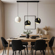 s.luce Ball Dining table pendant light Ø 30cm rotating shade 160cm canopy above a modern dining table