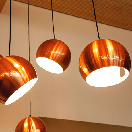 s.luce Ball Metal pendant light with a rotatable, replaceable shade in a copper look.