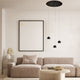 s.luce Beam Pendelleuchte in modernem Wohnzimmer mit minimalistischer Einrichtung und neutralen Farben.