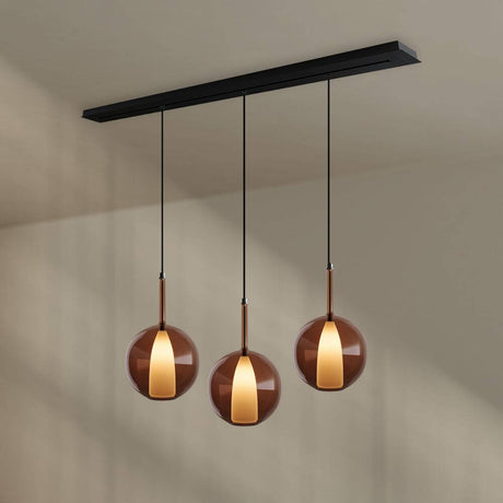 s.luce Belluna Esstischleuchte 3-flammig 160cm Baldachin aus mundgeblasenem Glas in Cognac.