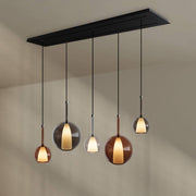 s.luce Belluna Esstischleuchte 5-flammig 160cm 2-reihig mit fünf eleganten Pendeln.