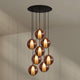 s.luce Belluna Galerieleuchte 8-flammig Ø 80cm Baldachin mit eleganten Glaskörpern in Cognac und klar.