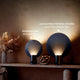 s.luce Cloud Tischleuchte mit dimmbaren Licht und austauschbarer Reflektor-Scheibe in elegantem Design.