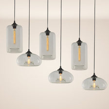 s.luce Cruet mehrflammige Hängeleuchte in modernem Design mit transparenten Glaskörpern.