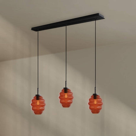 s.luce Echos Esstisch-Hängelampe 3-flammig 120cm Ø 18cm mit drei mundgeblasenen Glaskörpern in Orange.