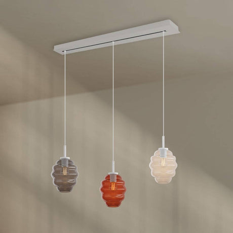 s.luce Echos Esstisch-Hängelampe 3-flammig 120cm Ø 18cm in Rauchtönen und Cognac-Farbe.