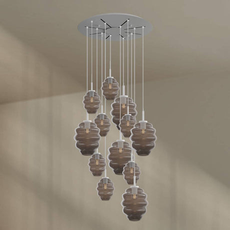 s.luce Echos Galerieleuchte mit 12 mundgeblasenen Glaskörpern in Braun, Rauch und Klar, ø 80cm.