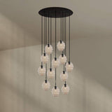 s.luce Echos Galerieleuchte 12-flammig mit mundgeblasenen Glaskörpern in eleganter Anordnung, Ø 80 cm.