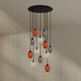 s.luce Echos Galerieleuchte 12-flammig mit bunten Glaskörpern und elegantem Baldachin.