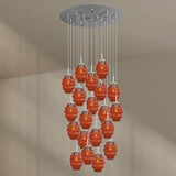 s.luce Echos Galerieleuchte mit 20 Pendeln aus orangefarbenem Glas, schwebend und modern.