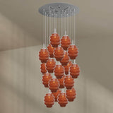 s.luce Echos Galerieleuchte mit 20 mundgeblasenen Gläsern in Orange, Ø 120 cm Baldachin, stylisches Lichtobjekt für große Räume.