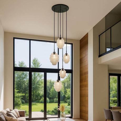 s.luce Echos 5-light gallery light Ø 60 cm canopy Ø 18/25 cm in a modern living space with large windows.