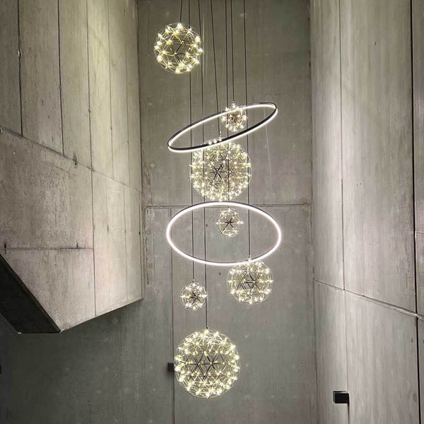 s.luce Fusion XXL Galerieleuchte 8-flammig LED-Ring mit eleganten LED-Ringen in einem modernen Wohnbereich