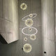 s.luce Fusion XXL Galerieleuchte mit 8 LED-Ringen und Lichtexplosion in modernem Wohnbereich