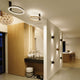 Moderne Ixa Wandleuchte mit quadratischer Abdeckung in stilvollem Wohnraum-Design.