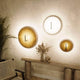 Moderne Wandleuchten in verschiedenen Größen, rund, mit sanftem Licht und minimalistischem Design.