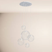 s.luce Orb 5-light gallery lamp Modular in a modern design with five hanging glass spheres.