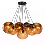 s.luce Orb Cluster Glas-Pendelleuchte 13-flammig 13x20cm in elegantem Design mit mundgeblasenen Glaskugeln für Wohnzimmer.