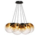 s.luce Orb Cluster Mehrfach-Pendelleuchte 7-flammig 7x20cm aus mundgeblasenem Glas für moderne Wohnräume.