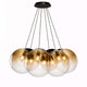 s.luce Orb Cluster Mehrfach-Pendelleuchte 7-flammig 7x40cm mit modernen, mundgeblasenen Glaskugeln für stilvolle Wohnräume.