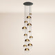 s.luce Orb 12-flammige Pendelleuchte mit modernen Glaskugeln in Gold- und Transparenteffekt.