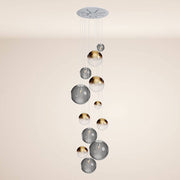 s.luce Orb Luminaire de galerie 12 feux Modular dans un design moderne avec des boules scintillantes.