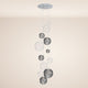 s.luce Orb Modular Pendelleuchte 12-flammig mit gläsernen Kugeln und modernem Baldachin.