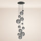 s.luce Orb Galerieleuchte 12-flammig-Modular, moderne Pendelleuchte mit eleganten Glaskugeln.