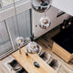 s.luce Orb glass ball pendant light above a modern dining table in a stylish living room.
