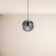 s.luce Orb glass ball pendant light in elegant design with shiny glass and visible light source.
