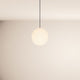 s.luce Orb glass ball pendant light in stylish design, floating from the ceiling.