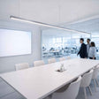 s.luce Oris LED linear light office pendant lamp XL made to measure 4000K in a modern office with a conference table.