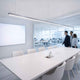 s.luce Oris LED linear light office pendant lamp XL made to measure 4000K in a modern office with a conference table.