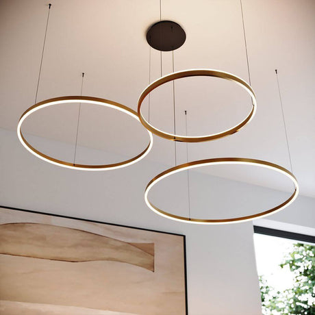 s.luce LED Ring pendant light Ø 80cm with three round rings in a modern design on the ceiling.