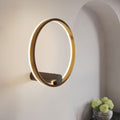 s.luce Ring Air Wandleuchte in Gold, runde Form, indirektes Licht für elegantes Wohnambiente.