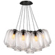 s.luce Velo Cluster Glas-Pendelleuchte 7-flammig 7x25cm mit voluminösen Glasleuchten in traubenförmiger Anordnung.