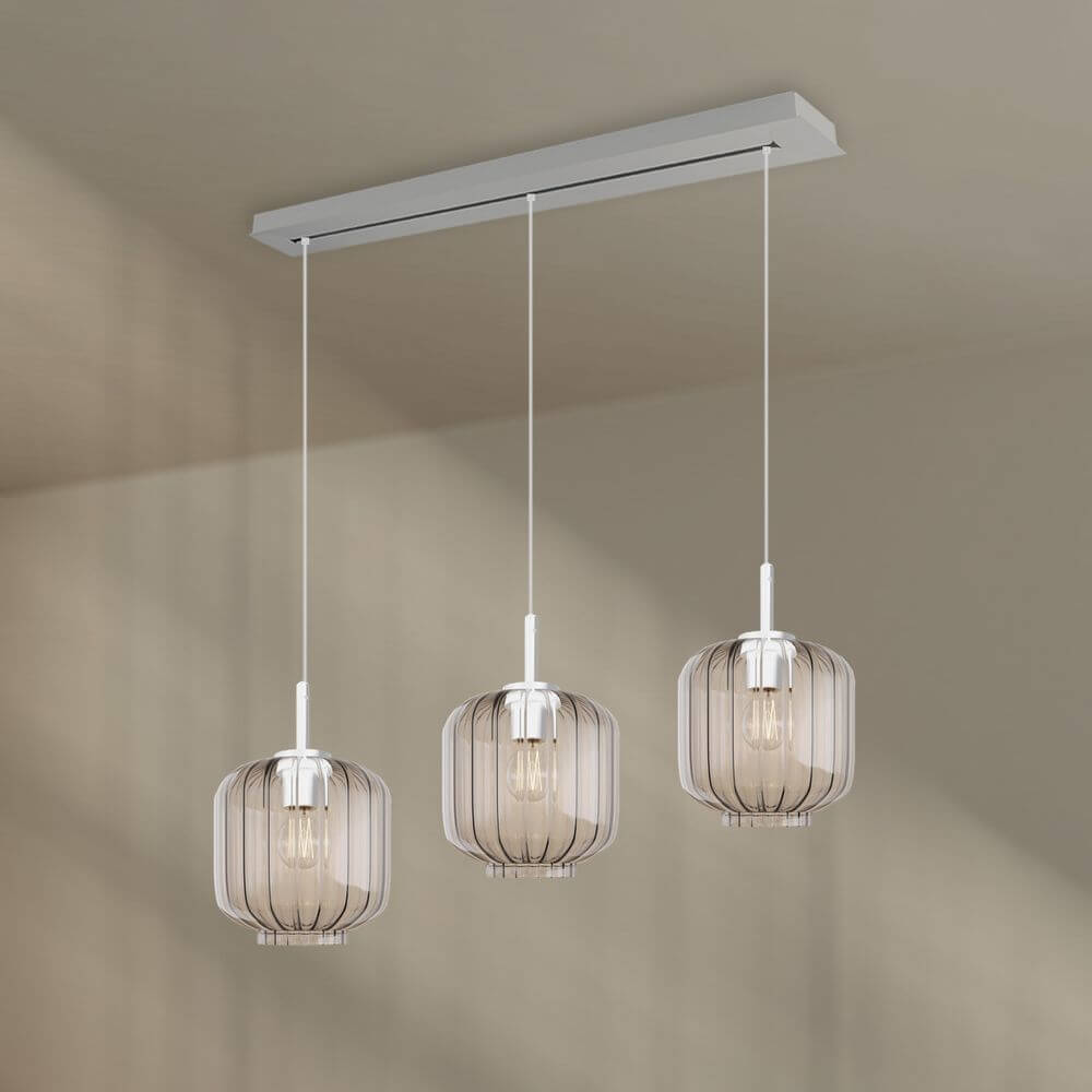 s.luce Velo Esstischlampe 3-flammig Baldachin 120cm Ø 20cm in elegantem Design über einem Esstisch.
