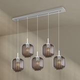 s.luce Velo Esstischlampe 5-flammig 160cm Baldachin Ø 20cm mit eleganten Glasleuchten über Esstisch.