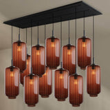 s.luce Velo 12-flammige Esstischleuchte mit edelstahl und Glas, stilvolles Design für modernes Esszimmer.
