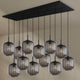 s.luce Velo Esstischlampe 12-flammig 200cm 3-reihig Ø 20cm mit eleganten Pendelleuchten aus Glas.