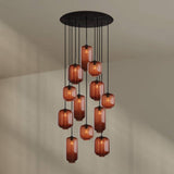 s.luce Velo 12-flammige Galerieleuchte mit mundgeblasenen Glas-Pendelleuchten in edlen Farben