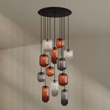 s.luce Velo 12-flammige Galerieleuchte mit eleganten Glas-Pendelleuchten in verschiedenen Farben.