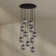 s.luce Velo 12-flammige Galerieleuchte Ø 80cm Baldachin Ø 20cm in elegantem Design mit Glas-Pendelleuchten.