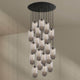 s.luce Velo Galerie-Pendelleuchte 20-flammig Ø 120cm Ø 18cm mit modernen Glas-Pendelleuchten an Baldachin.